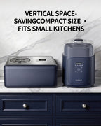 Compact navy compressor ice cream maker shown beside a larger countertop appliance